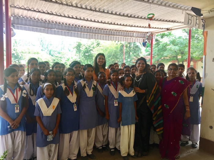 Priyanka Raina with Teacher and Chidren