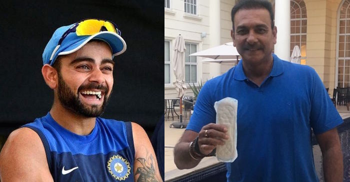 Twitterati savagely trolled Ravi Shastri for holding sanitary pad like a bottle of beer