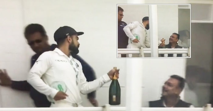 Twitterati hilariously trolls Ravi Shastri after Virat Kohli handed him the Champagne bottle