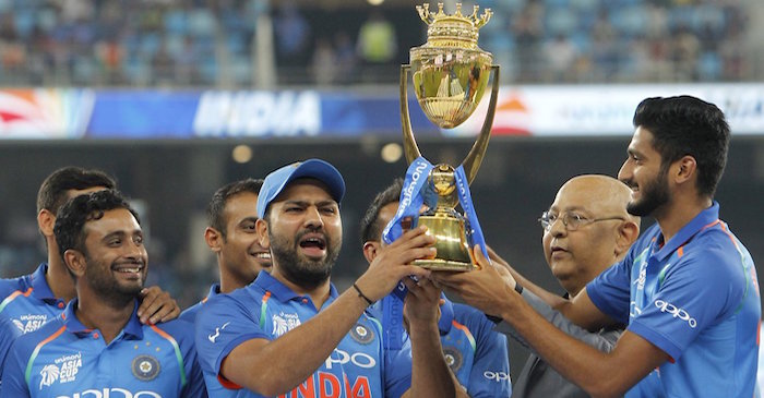 Rohit Sharma hands over the Asia Cup 2018 trophy to debutant Khaleel Ahmed