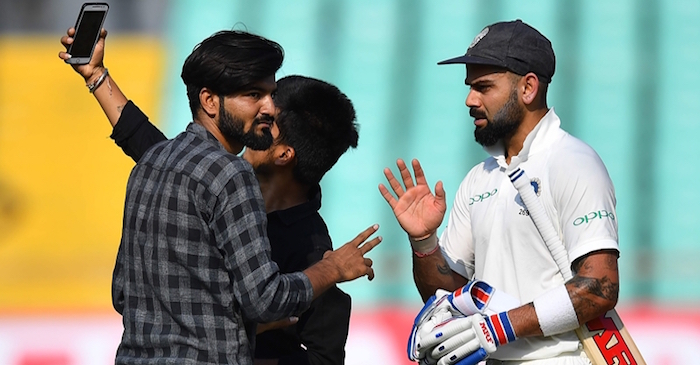 Fans breach security to click selfie with Virat Kohli during 1st Test against Windies