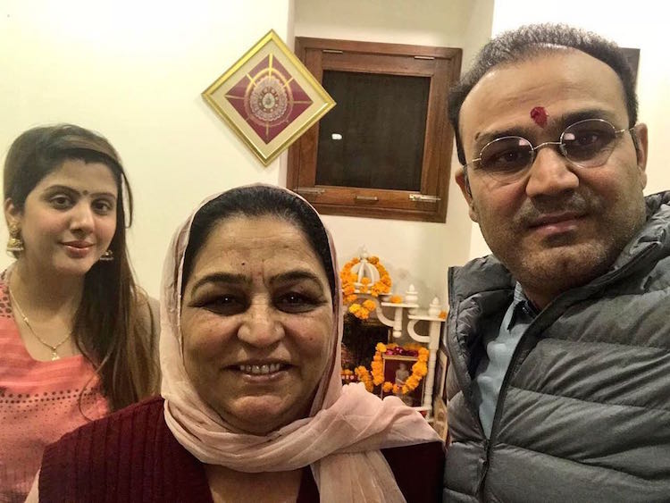Virender Sehwag with his mother and wife Aarti