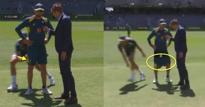 Mitchell Starc pulls down Nathan Lyon’s shorts during an interview