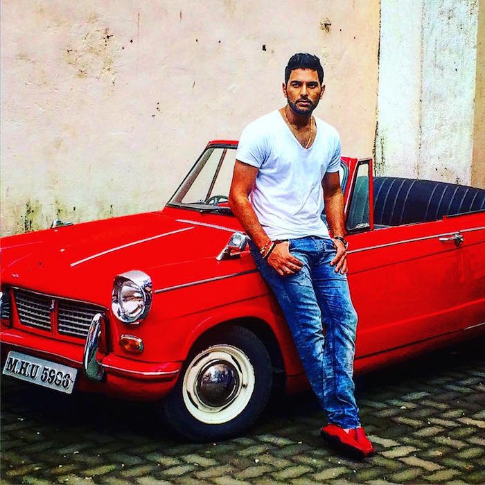 Yuvraj Singh red vintage car