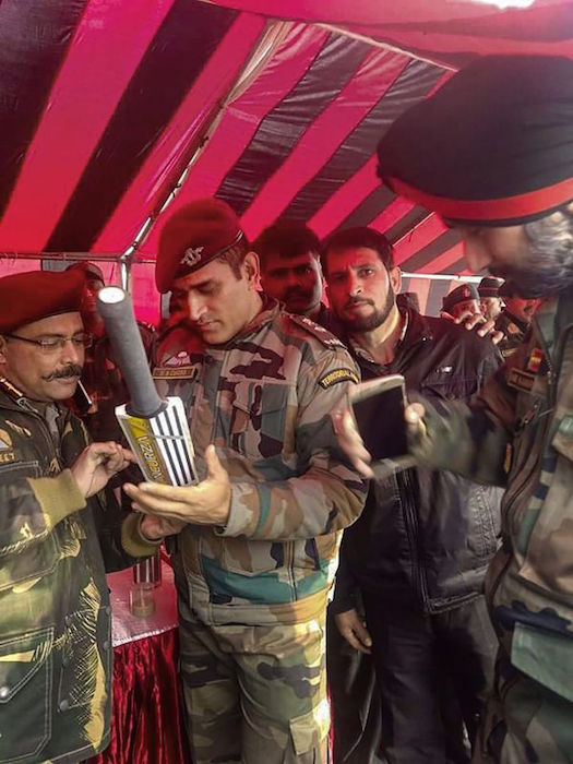 MS Dhoni signing bat