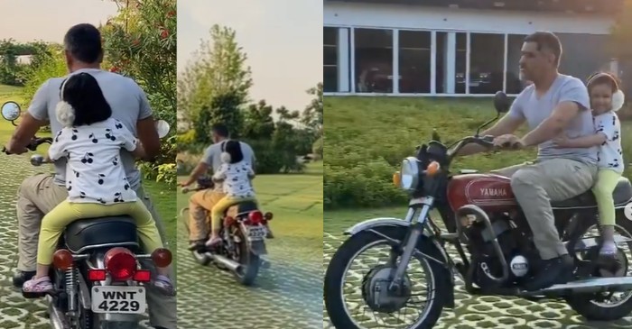 WATCH: Sakshi shares a video of MS Dhoni giving Ziva a bike ride inside his farmhouse