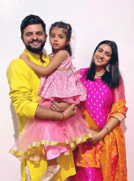 Suresh Raina with his daughter Gracia and wife Priyanka