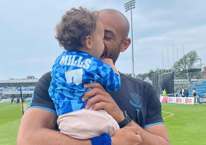 Tymal Mills with his daughter