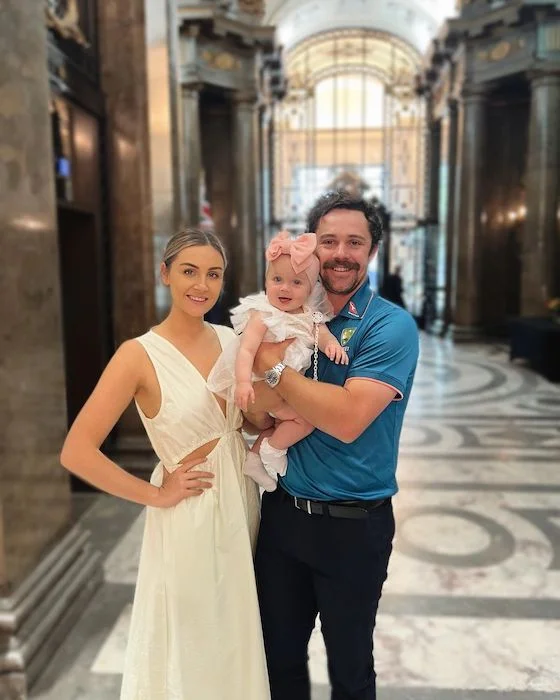 Travis Head, Jessica Davies with their daughter